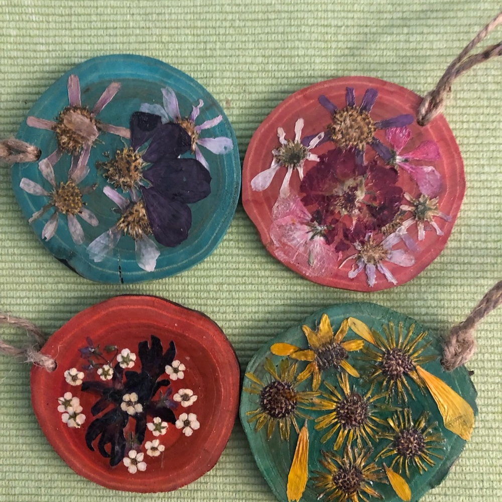 Set of 9 All occasion ornaments. Pressed flowers on a 3 inch natural wood disc.